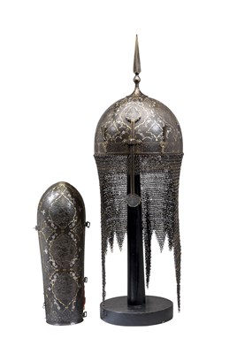 Lot 91 - AN INDO-PERSIAN GARNITURE OF DECORATED ARMOUR