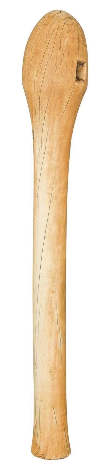 Lot 124 - AN AFRICAN IVORY AXE HAFT