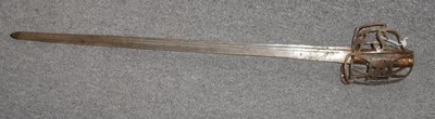 Lot 140 - A BASKET-HILTED BROADSWORD