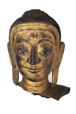 Lot 272 - A FRAGMENTARY HEAD OF BUDDHA, BURMA, 19TH CENTURY