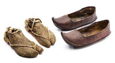 Lot 23 - **A PAIR OF CHINESE LEATHER SANDALS