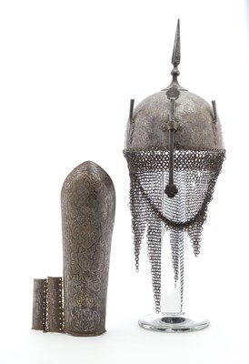 Lot 43 - **AN INDO-PERSIAN HELMET (KULAH-KHUD) AND ARM DEFENSE (BAZU BAND)