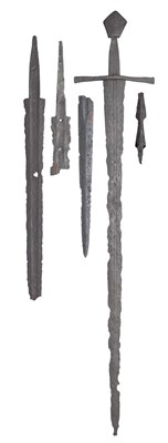 Lot 60 - **THREE FRAGMENTED SWORD-BLADES