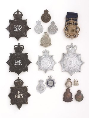 Lot 52 - FIVE METROPOLITAN HELMET PLATES three with ERII cypher