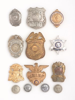 Lot 53 - NINE AMERICAN POLICE BADGES including badges for a Florida Chief
