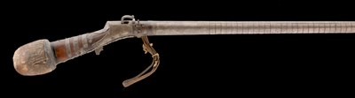 Lot 104 - A 22 BORE INDO-ARAB SILVER-MOUNTED MATCHLOCK MUSKET FROM THE ARMOURY OF THE MIR AKBAR ALI KHAN SIKAN