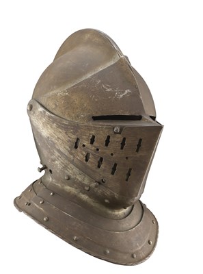 Lot 269 - A CLOSE HELMET IN GERMAN 16TH CENTURY STYLE