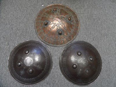 Lot 33 - â€¡ TWO INDIAN IRON SHIELDS (DHAL) AND ANOTHER