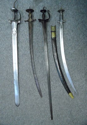Lot 63 - TWO INDIAN SWORDS (KHANDA) AND TWO FURTHER SWORDS (TALWAR)
