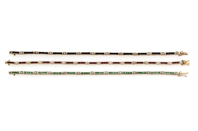 Lot 341 - A SET OF THREE GOLD , GEM-SET AND DIAMOND LINE BRACELETS, 1990s