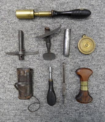 Lot 150 - A PERCUSSION TOOL IN ITS LEATHER POUCH