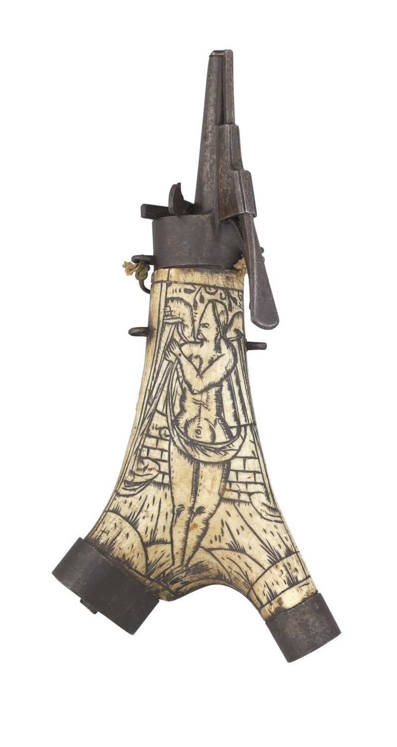 Lot 165 - A GERMAN ENGRAVED STAGHORN POWDER-FLASK
