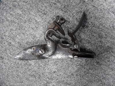 Lot 410 - A DETACHED FLINTLOCK FOR AN EAST INDIA COMPANY GUN BY MOORE