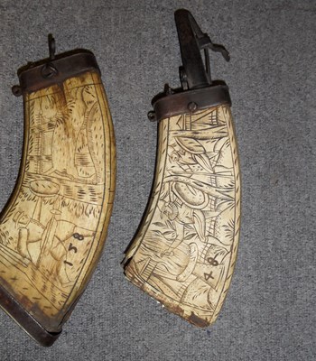 Lot 479 - TWO GERMAN ENGRAVED COWHORN POWDER-FLASKS