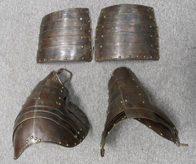 Lot 598 - A PAIR OF SOUTH GERMAN PAULDRONS AND TASSETS WITH ENGRAVED DECORATION