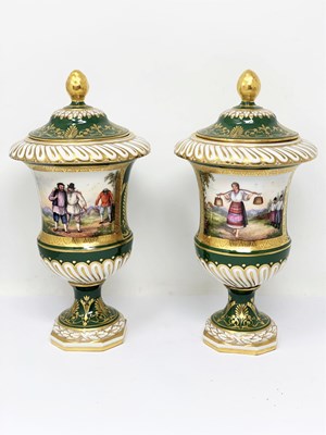 Lot 7 - â–¡ A PAIR OF CONTINENTAL PORCELAIN VASES AND COVERS