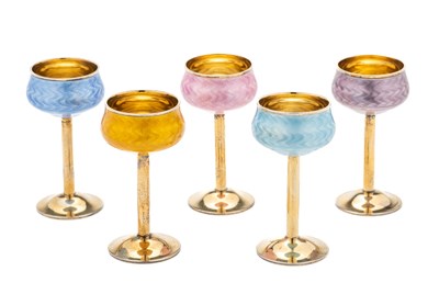 Lot 113 - A SET OF FIVE NORWEGIAN SILVER-GILT AND ENAMEL AQUAVIT GOBLETS