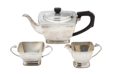 Lot 136 - AN ART DECO SILVER THREE-PIECE TEA SET