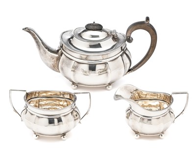 Lot 149 - A GEORGE V SILVER THREE-PIECE TEA SET