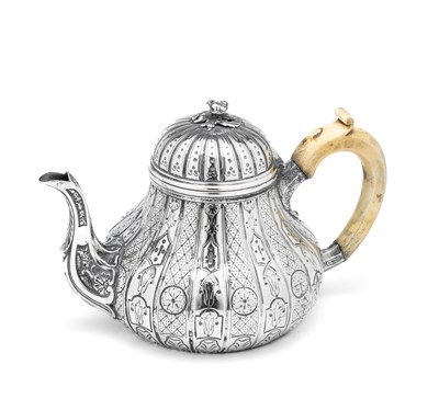 Lot 179 - ËœA VICTORIAN SILVER TEAPOT