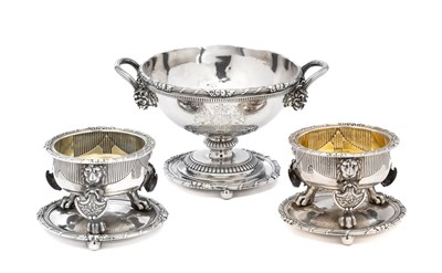 Lot 216 - â€¡ AMBASSADORIAL PLATE: A PAIR OF GEORGE III SILVER SALT CELLARS ON STANDS AND A SAUCE TUREEN AND A