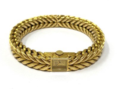 Lot 282 - GOLD BRACELET WATCH, BOUCHERON, PARIS, CIRCA 1964