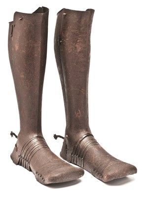 Lot 152 - A PAIR OF GERMAN GREAVES AND SABATONS IN EARLY 16TH CENTURY STYLE