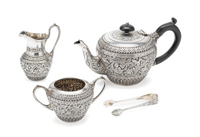 Lot 211 - A VICTORIAN SILVER BACHELOR'S THREE-PIECE TEA SET WITH TONGS, WILLIAM HUTTON & SONS OF SHEFFIELD, LONDON, 1886