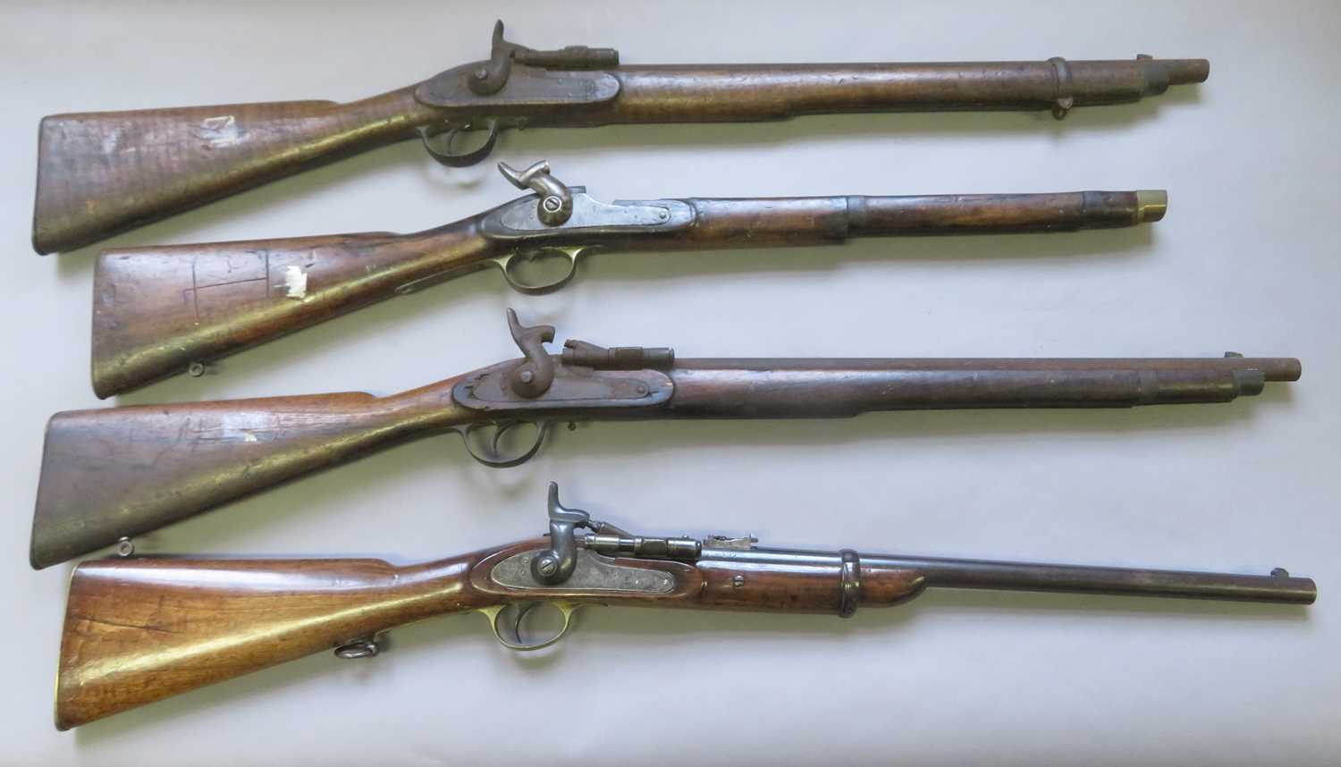 Lot 518 - â’¶ FOUR .577 CALIBRE BREECH-LOADING PERCUSSION SNIDER-ENFIELD CARBINES, THE FIRST DATED 1871