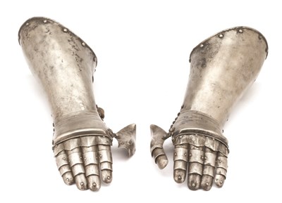 Lot 274 - **A PAIR OF ELBOW GAUNTLETS IN THE GERMAN STYLE OF CIRCA 1580