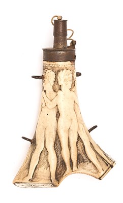 Lot 305 - A GERMAN CARVED STAGHORN POWDER-FLASK