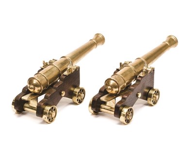 Lot 316 - AN UNUSUAL PAIR OF MINIATURE BRASS CANNON