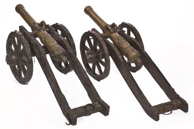 Lot 321 - **A PAIR OF BRONZE SALUTING CANNON IN 17TH CENTURY STYLE
