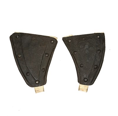 Lot 126 - A PAIR OF CHEEK-PIECES FROM A HARQUEBUISERS POT