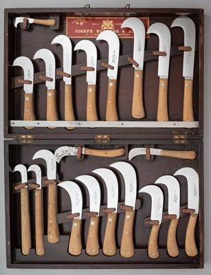 Lot 631 - A CASED SET OF TWENTY-ONE CLEAVERS, PERHAPS FOR PLANTATION USE, JOSEPH RODGERS & SONS, CUTLERS TO HIS MAJESTY, 6 NORFOLK STREET, SHEFFIELD, 20TH CENTURY