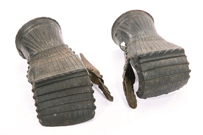 Lot 364 - A PAIR OF GERMAN GAUNTLETS WITH FLUTED DECORATION IN THE 'MAXIMILIAN' FASHION