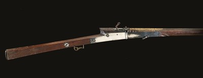 Lot 535 - **A 22 BORE INDIAN SILVER-MOUNTED MATCHLOCK MUSKET