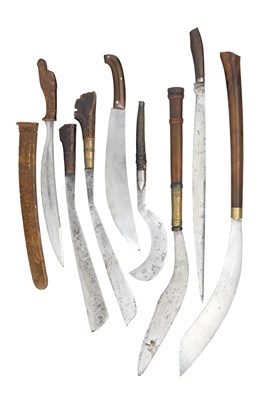 Lot 47 - **TEN SOUTHEAST ASIAN EDGED WEAPONS COMPRISING A GOLOK