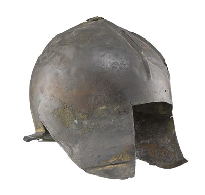 Lot 113 - **AN ILLYRIAN BRONZE HELMET