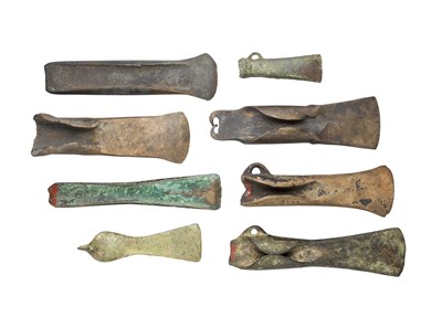 Lot 114 - **EIGHT BRONZE AXEHEADS