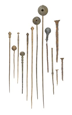 Lot 124 - **A GROUP OF TEN PINS AND THREE NAILS