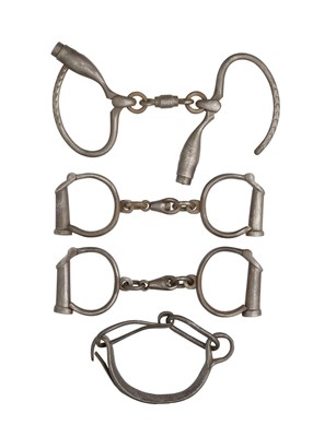 Lot 167 - **THREE PAIRS OF HAND CUFFS AND A SINGLE SHACKLE