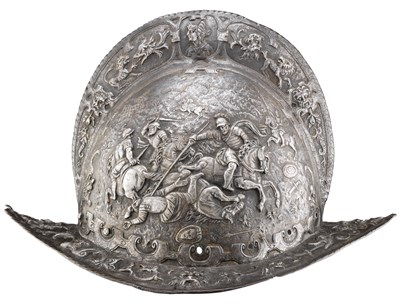 Lot 290 - **A COMB MORION WITH EMBOSSED DECORATION
