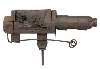 Lot 463 - **A FLINTLOCK SPRING TRAP GUN