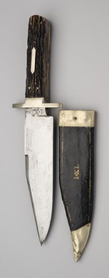Lot 647 - A BOWIE KNIFE, G. WOSTENHOLM & SON, WASHINGTON WORKS, SHEFFIELD, EARLY 20TH CENTURY AND A DAGGER FOR THE AMERICAN MARKET, LATE 19TH CENTURY