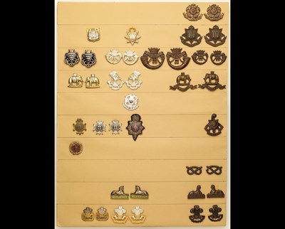 Lot 177 - A collection of mainly officers' collar-badges. 	Examples for the East Surrey Regiment