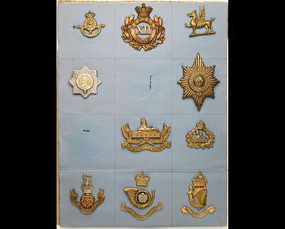 Lot 178 - A collection of officers' collar-badges and other items.