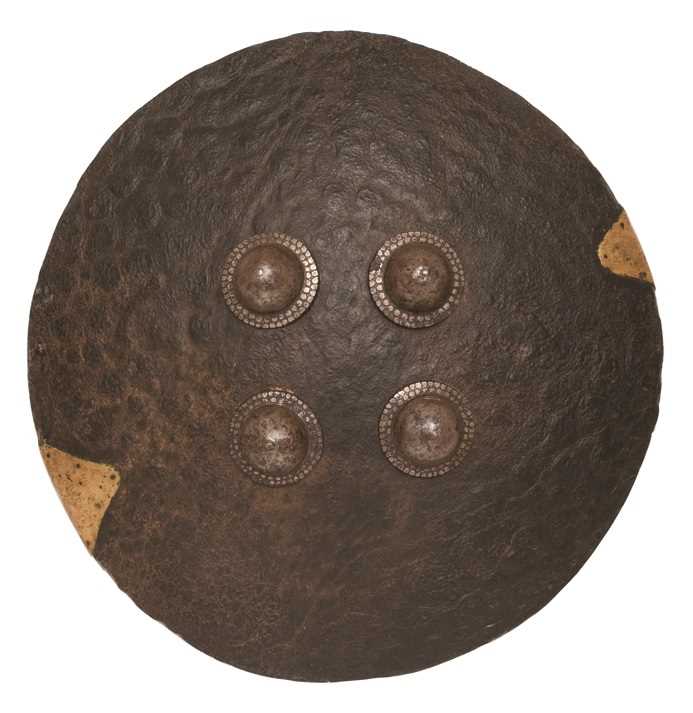 Lot 76 - A RARE INDIAN ELEPHANT HIDE SHEILD