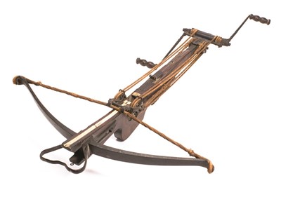 Lot 334 - **A FLEMISH TARGET CROSSBOW AND WINDLASS