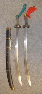 Lot 53 - â€¡ A PAIR OF CHINESE SWORDS (SHUANGNIUWEIDAO)